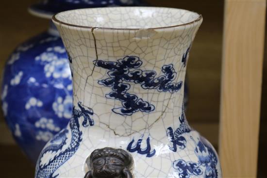 A large 19th century Chinese blue and white vase and cover and a crackle glaze dragon vase tallest 42cm